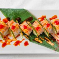 Jimbaran Bay Roll · Chopped fresh yellowtail in spicy 
sauce, cucumber and scallions 
inside topped with fresh y...