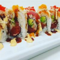 Sakura Roll · Imitation Crab, Spicy Tuna, Avocado and cucumber topped with Salmon, Tuna, White fish, tempu...