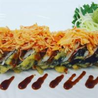 Delicato Roll · Shrimp tempura, cream cheese and avocado in tempura style topped with spicy crab.