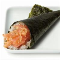 Spicy Salmon Hand Roll · Traditional one piece cone shaped hand roll with Chopped salmon and avocado in spicy sauce.