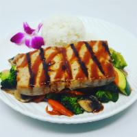 Tuna Teriyaki  · Fresh Hawaiian ahi tuna, seasoned with Japanese spice and grilled to perfection. Served with...