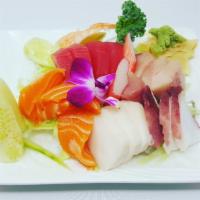 Sashimi Deluxe · 18 chef choice pieces of the finest sashimi .