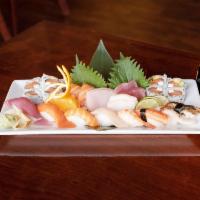 Sushi ＆ Sashimi Combo · Assorted 8 pieces of sashimi and 8 pieces of sushi with Philadelphia roll.