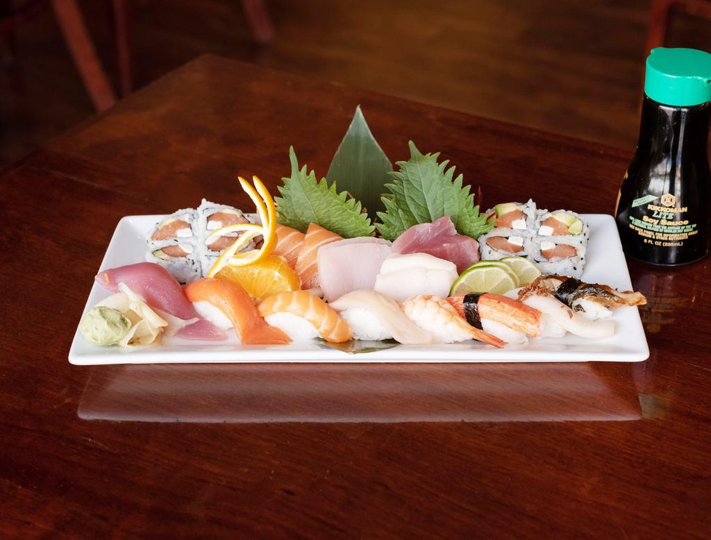 Sushi ＆ Sashimi Combo · Assorted 8 pieces of sashimi and 8 pieces of sushi with Philadelphia roll.
