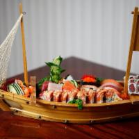 House Boat · Assorted 12 pieces of sashimi and 15 pieces of sushi with spider roll, spicy tuna roll and c...