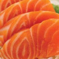 Salmon Sashimi · 4 thinly sliced pieces of raw sushi grade salmon.