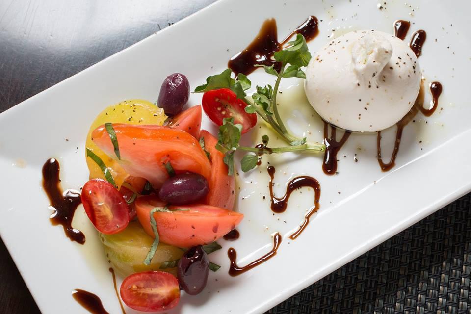 Burrata Cheese and Tomatoes  · Tomatoes, basil, extra virgin olive oil, balsamic glaze and fresh mozzarella filled with cream and curds.