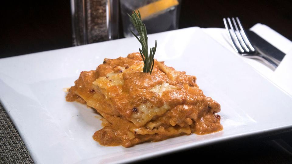 Lasagna Della Nonna  · Layered pasta with meat sauce and bechamel.
