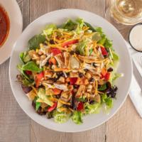 Santa Fe Salad · Grilled chicken, corn, mixed beans, tomatoes, diced red bell peppers, cheddar cheese and tor...