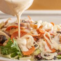 La Rosa Salad · Breaded chicken, mixed greens, sliced pepperoni, olives, mozzarella and onions in a creamy I...