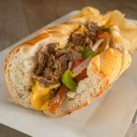Philly Cheesesteak Sandwich · Peppers and onions.