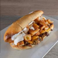 Fat Bastard Sandwich · Cheesesteak, mozzarella sticks, onion rings, chicken cutlet, french fries and mayo.