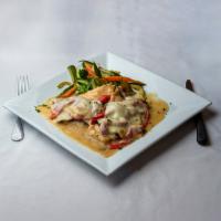 Chicken Luca · In a garlic wine sauce, topped with grilled eggplant, roasted peppers and provolone with sau...