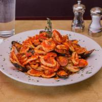 Seafood Marinara · Choice of sauce with shrimp, clams, mussels, calamari and scungilli over linguine.