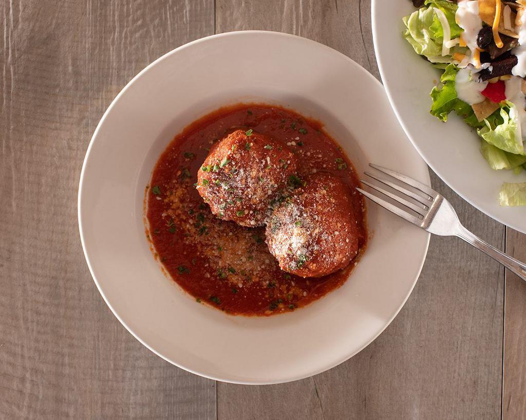 2 Homemade Meatballs · Made with pork, beef and veal.