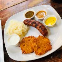 Thuringer Wurst (1 wurst) · Beef, pork and garlic.
Served with haus saurkraut and 1 side. 