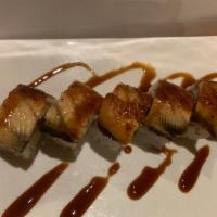 Eel Special Roll · Tuna and avocado inside with eel on the top.