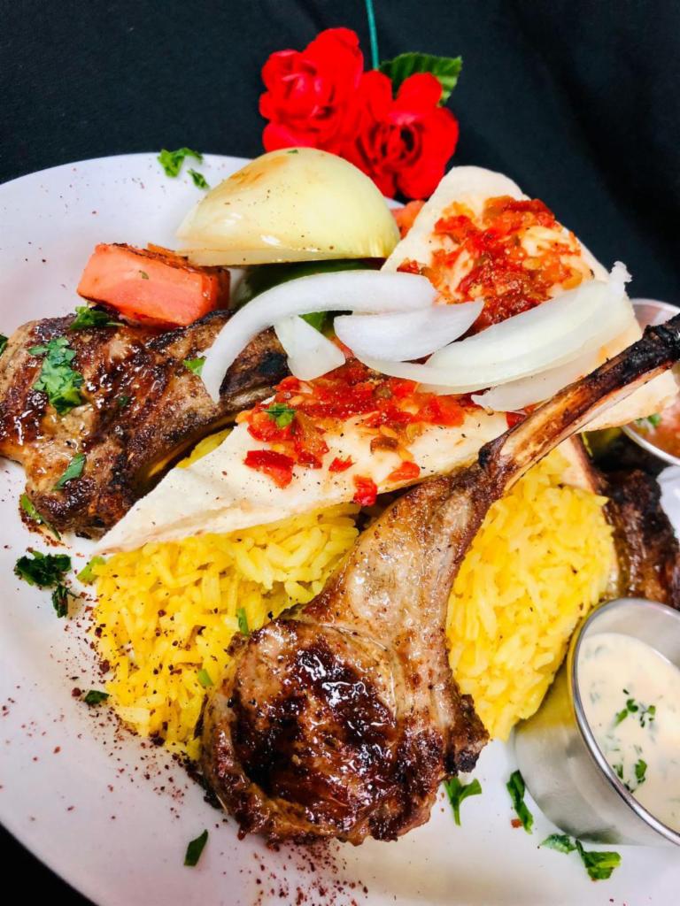 Special Lamb Chops · Rack of lamb. 4 charbroiled lamb chops. Served with rice and grilled vegetables.