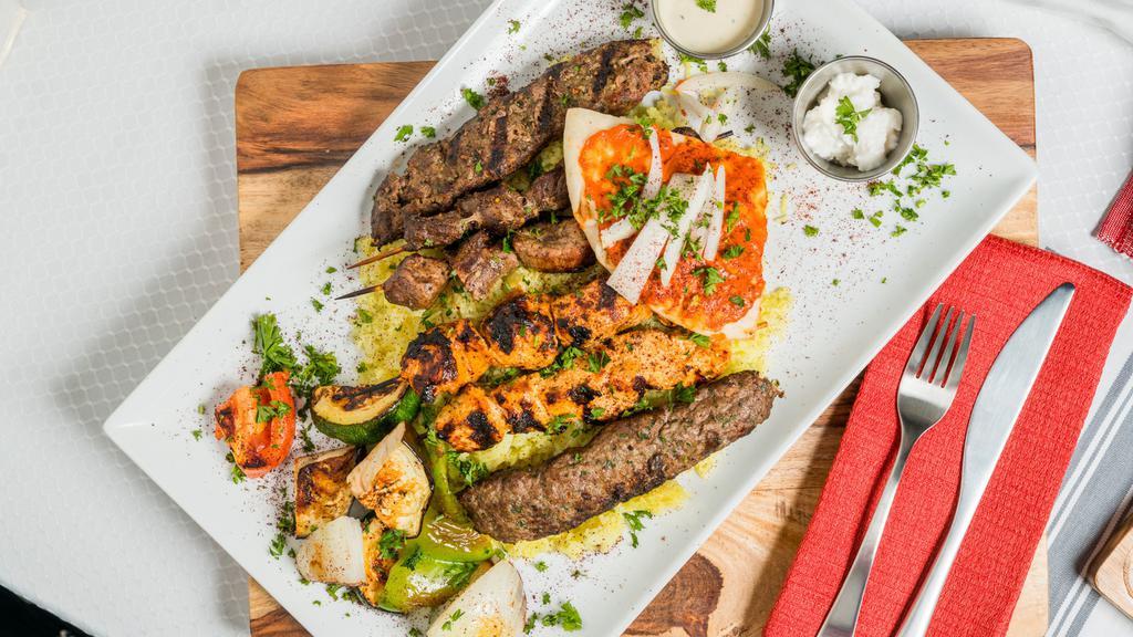 Mixed Grill for 2 · A delicious combination of Beef Kebab, Kofta Kebab, lamb Kebab, Chicken kebab & Gyro Served with rice and grilled vegetables.
Add rack of lamb for an additional charge.