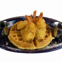 Waffles and Jumbo Shrimp · Served with warm maple syrup.