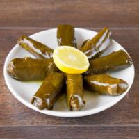 Grape Leaves · A side of grape leaves (8) stuffed with rice and a mix of authentic Mediterranean herbs and ...