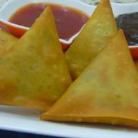 Chicken Samosa · Made from scrath in our kitchen. hand made flaky golden apastry, stuffed with chicken. deep-...