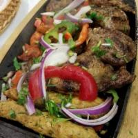 Mix Grill Platter · Turkish kabob, chicken tikka, chicken tikka boti, seekh kabab.