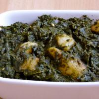 Aloo Palak · A vegetarian favourite spinach and potatoes cooked with organic herbs.