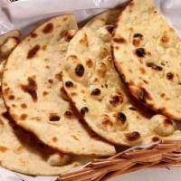 Tandoori Roti · Made from whole wheat flour and made in clay oven.