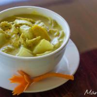 25. Green Curry  · Kang kiew wan. Coconut milk, bamboo shoots, green beans, bell peppers eggplants, kaffir lime...