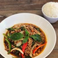 Gra-Pow Chicken · Hot and spicy sauteed minced chicken with onions, bell peppers and basil leaves in Thai styl...