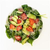 Spinach Avocado Salad · Spinach, avocado, strawberries and Parmesan cheese with raspberry dressing.