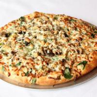 Nutty Chicken Gourmet Pizza · Roasted cashews, roasted chicken, fresh mushrooms, spinach, and grated Parmesan.