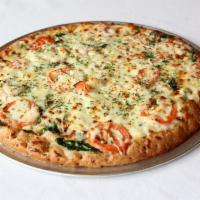 Sereen Gourmet Pizza · On whole wheat. Alfredo sauce, baby spinach, Roma tomatoes, fresh garlic, feta, and mozzarel...