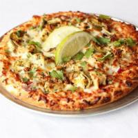 Scorcher Gourmet Pizza · Spicy red sauce, chicken, red onions, roasted corn, jalapenos, garlic, and mozzarella.