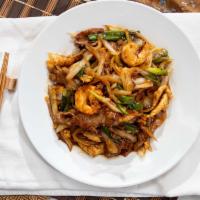 Mongolian Triple Delight · Sliced beef, chicken and shrimp marinated, sauteed with green and white onion in chef's spec...
