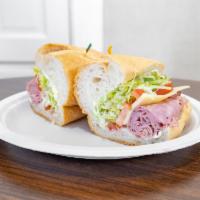 Hampton Specialty Sandwich · Maple honey ham and Swiss cheese, topped with lettuce, tomatoes and mayonnaise served hot or...