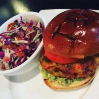Vegan Burger on Brioche Bun · Masala vegan burger with sliced tomato & fresh guacamole.