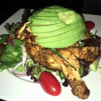Blackened chicken avocado salad · Served over romaine  tomatoes, cucumber, red onion, with a house made balsamic dressing on t...