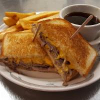 Beef & Cheddar Melt · Our thin sliced roast beef topped with cheddar cheese and served on grilled sourdough with a...