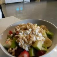 Baja Salad · Mix of fruits- apples, bananas, strawberries and grapes top with cottage cheese, honey, and ...