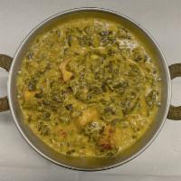 80. Palak Paneer · Tender spinach and cubed farmer's cheese cooked with spices.