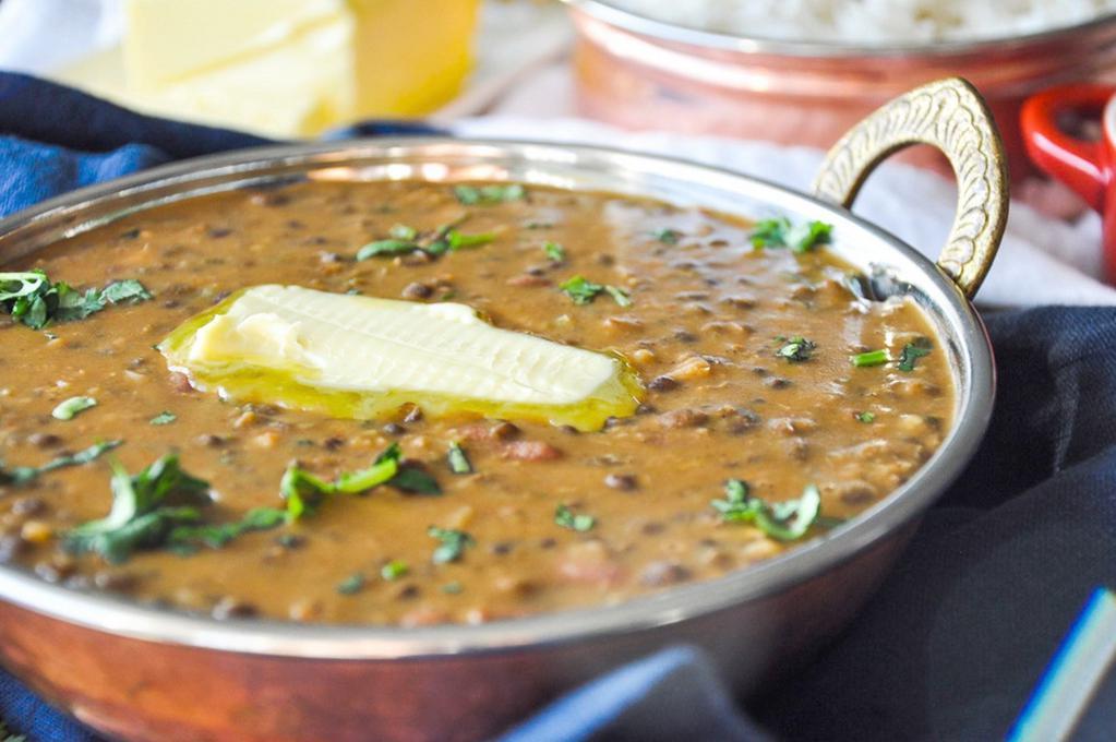 82. Dal Makhani · Black lentils and kidney beans cooked in a buttery sauce with onions and Indian spices.