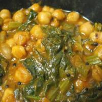 88. Sag Chana · Garbanzo beans and spinach with authentic Indian spices. Vegan.