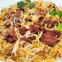 Goat Briyani · Basmati rice flavored and cooked with Goat and India Curry House's special biryani masala.