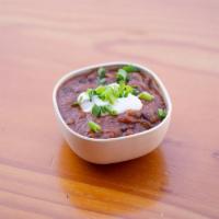 Chili · Cup of House-Made Chili topped with Sour 
Cream and Organic Green Onions
130 cals / 7g pro...