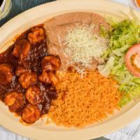 Camarones a la Diabla · Shrimp in a hot spicy sauce with rice, beans, lettuce, tomatoes and cheese. 