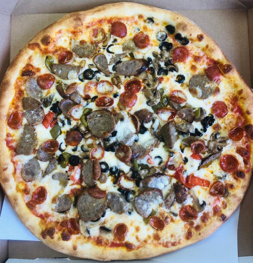 Super Deluxe Pizza · Pepperoni, sausage, meatball, bacon, green peppers, black olives, mushrooms, onions and extra cheese.