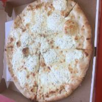 White Pizza · Neapolitan pie topped with melted mozzarella and ricotta cheese