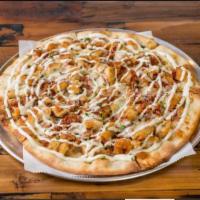 Bacon Chicken Ranch Pizza · Mozzarella cheese, maple grazed bacon and chopped tomatoes topped with cheddar and ranch dre...